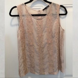 Sheer beige sleeveless blouse